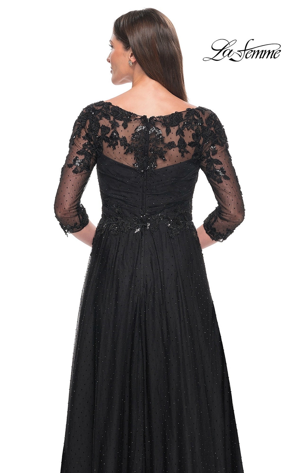 Back view of the Long Formal Dress: La Femme 31776, a black beaded evening gown featuring three-quarter sleeves, a sheer embellished bodice, and a full skirt with subtle polka-dot detail.
